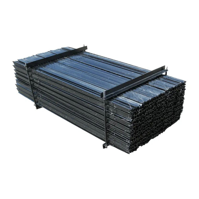 Stack of black metal fence posts bundled together for sturdy outdoor fencing