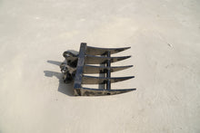 Rippa Australia excavator rake attachment with sturdy metal tines for digging and clearing debris