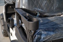 Close-up of a cup holder on a Labadi Engineering Golf Cart seat for convenience while driving