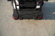 Rear view of a Labadi Engineering Golf Cart with a sturdy black bumper and textured surface