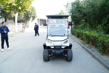 White Golf Cart on a pathway, showcasing a sleek design and rugged wheels for outdoor use