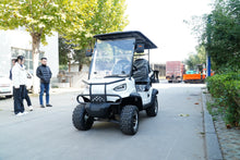 Labadi Engineering Golf Cart in White with a Clear Canopy and Off-Road Tires on a Street
