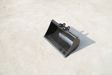 Rippa Australia black Mud Bucket excavator attachment on concrete surface