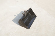 Rippa Australia black excavator Mud Bucket attachment on concrete surface
