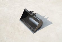Rippa Australia black excavator attachments Mud Bucket with reinforced edges on concrete surface