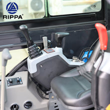 Interior view of Labadi Engineering mini excavator controls and seat with joystick operation