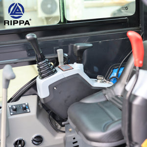 Interior view of Labadi Engineering mini excavator controls and seat with joystick operation